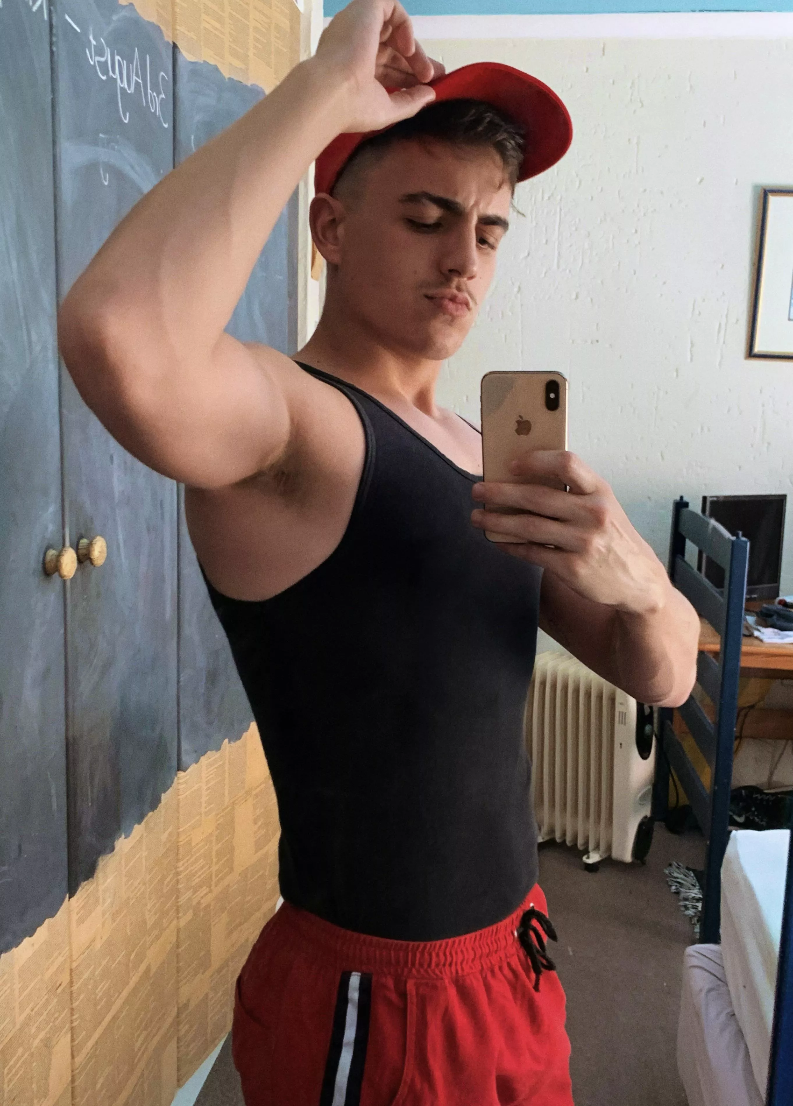 Is it dumb that I felt cute in my red shorts and cap today?😂