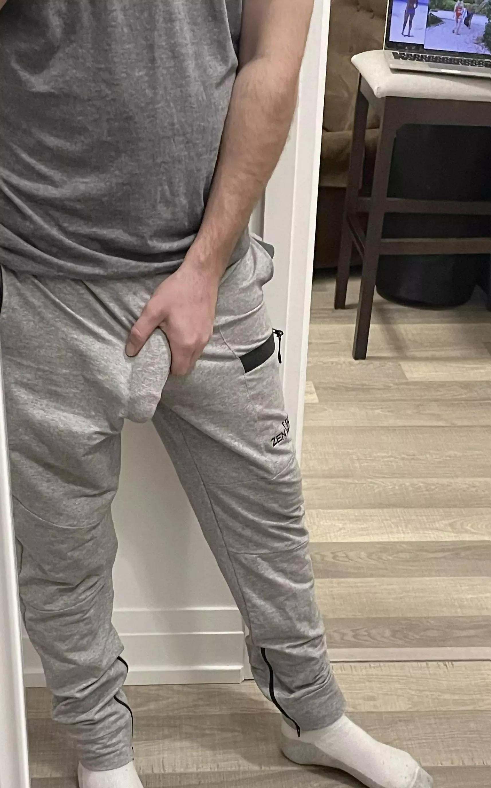 Bulge in grey sweatpants