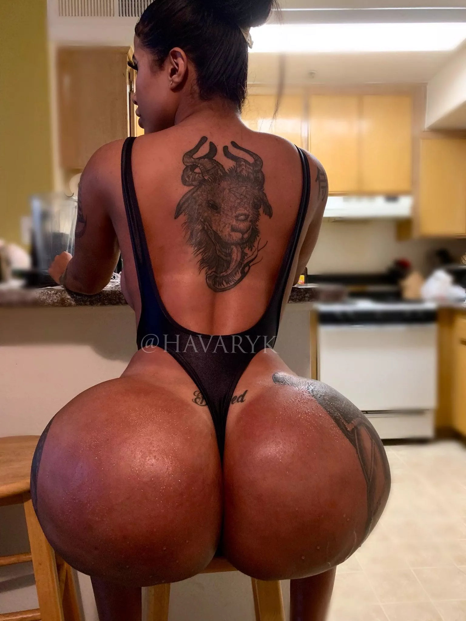 Tatted back and huge ass