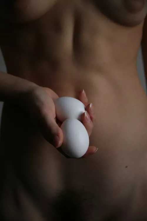 Women with eggs. Selfportrait
