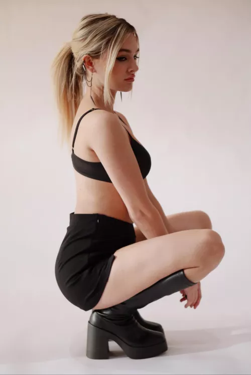 Badass blonde chick in her fave boots