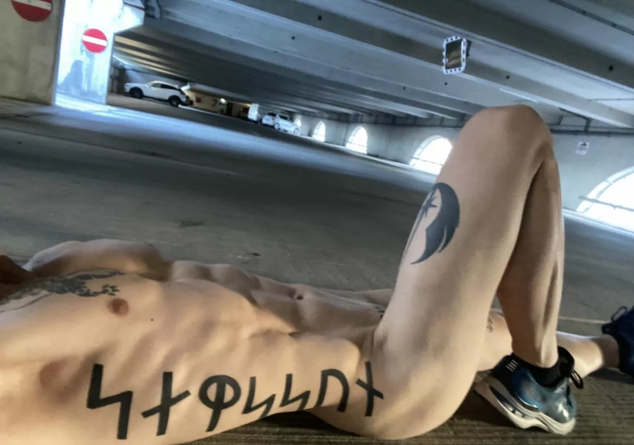 Naked in parking garage