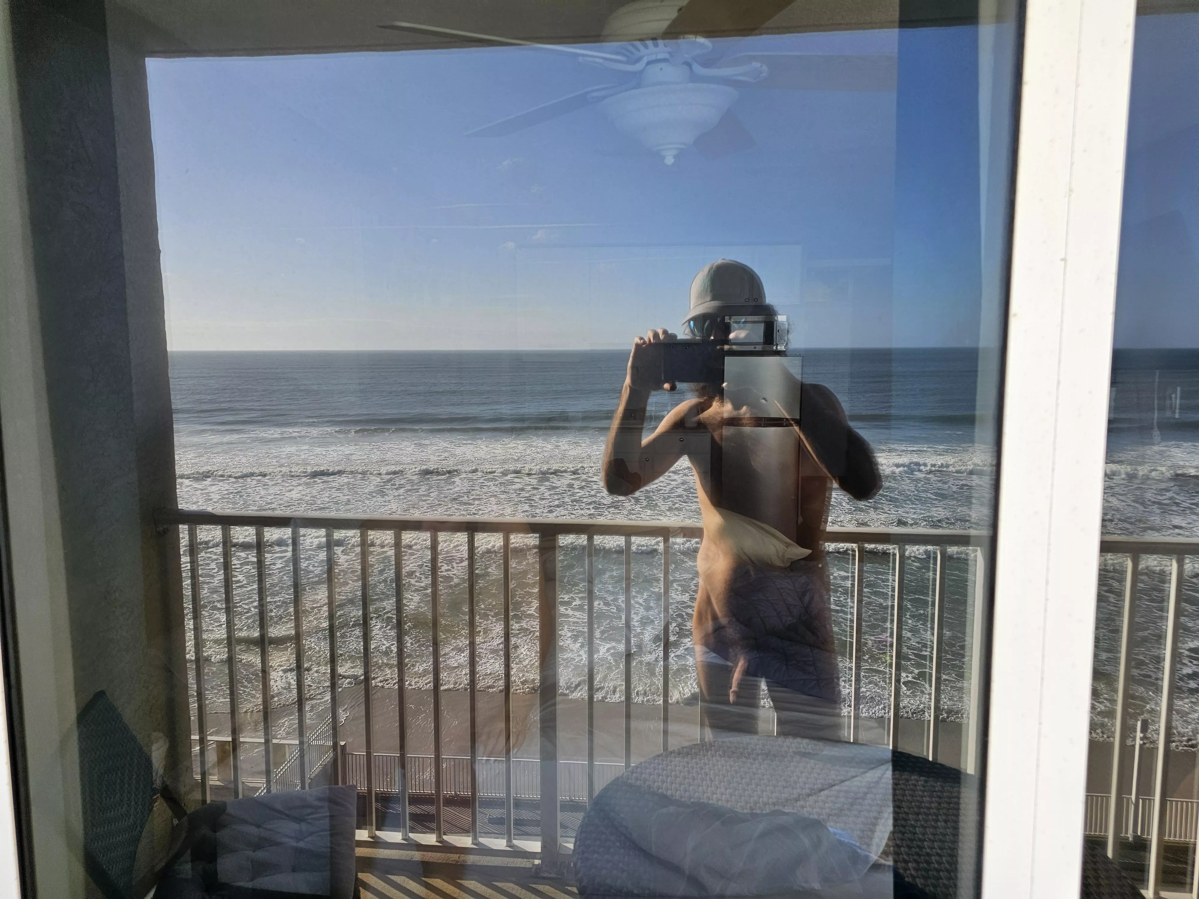 Getting some early morning sun on the hotel balcony