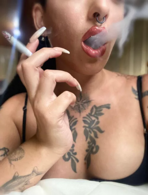 I love the smoke that rises up my face when I smoke.