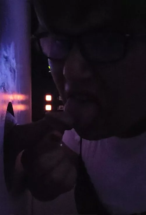 Sucking cock at adult arcade.