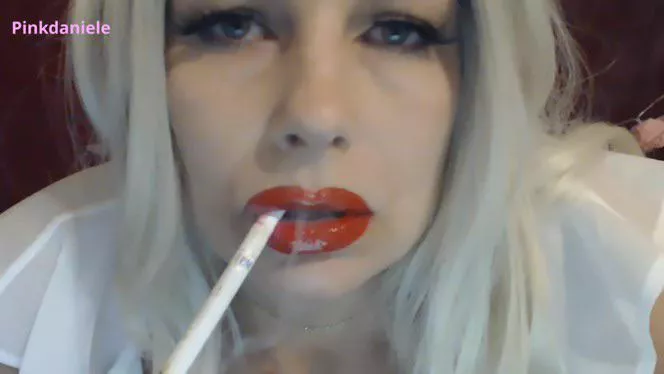 Cigarette in red lips