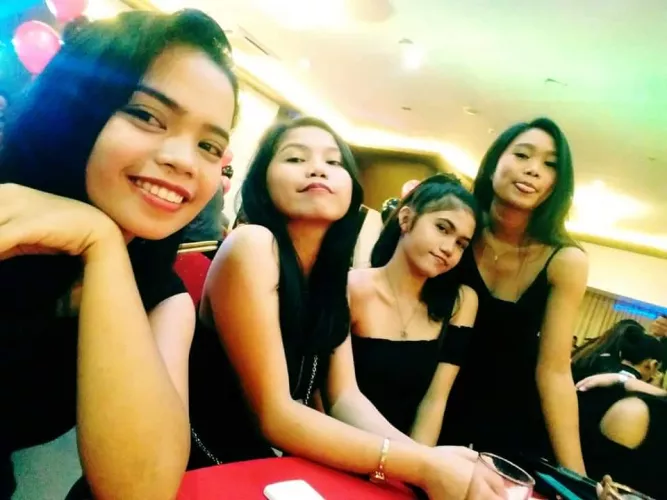 Rank these black dress partygoers