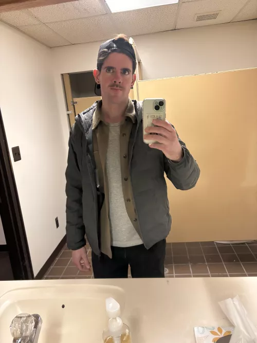 Wearing the stache and enjoying a small concert. 🎶 