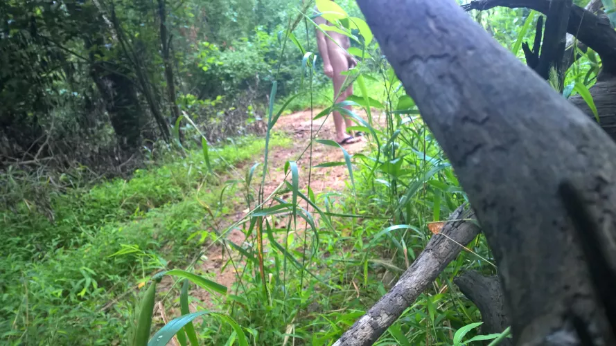 completely naked hiking outdoors