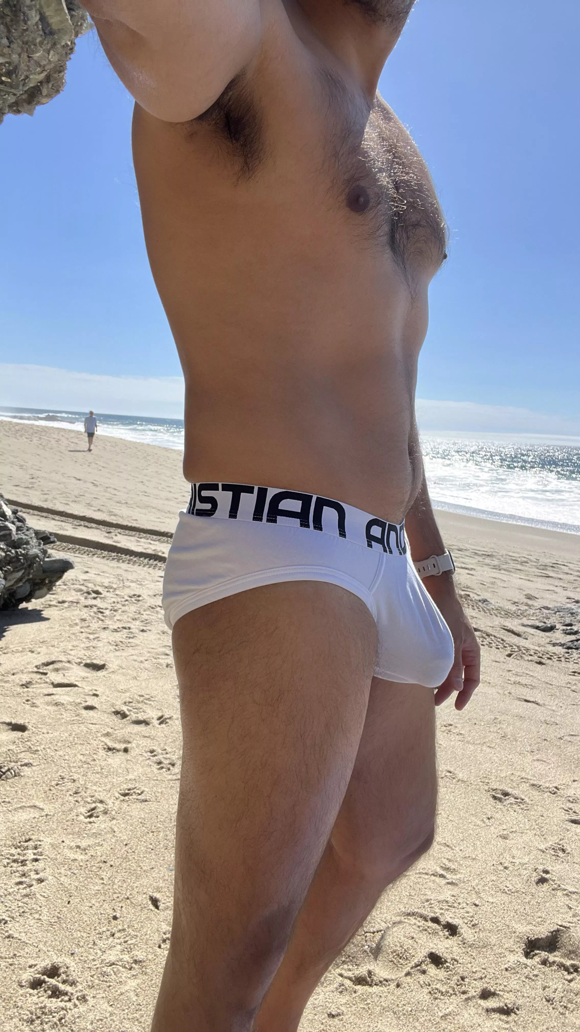 stripping down to my underwear at the beach, just before changing into to my speedos