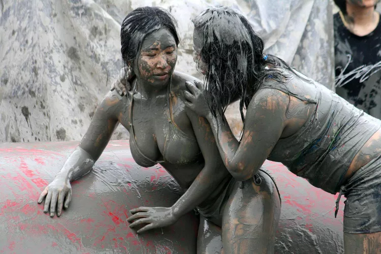The absolute sexiest photo on Wikipedia is this babe mud wrestling
