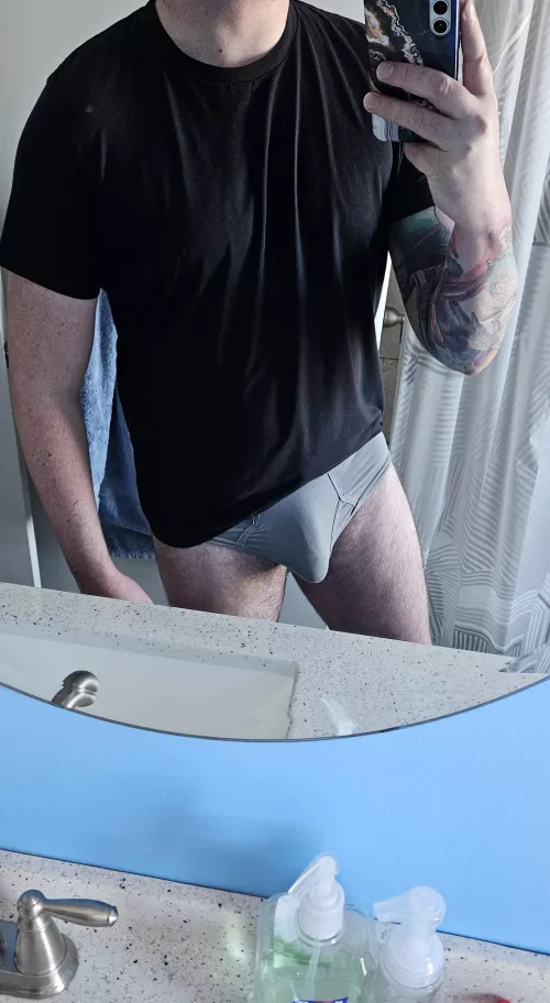 These grey briefs are one of my favorite for showing my bulge. What do you think?