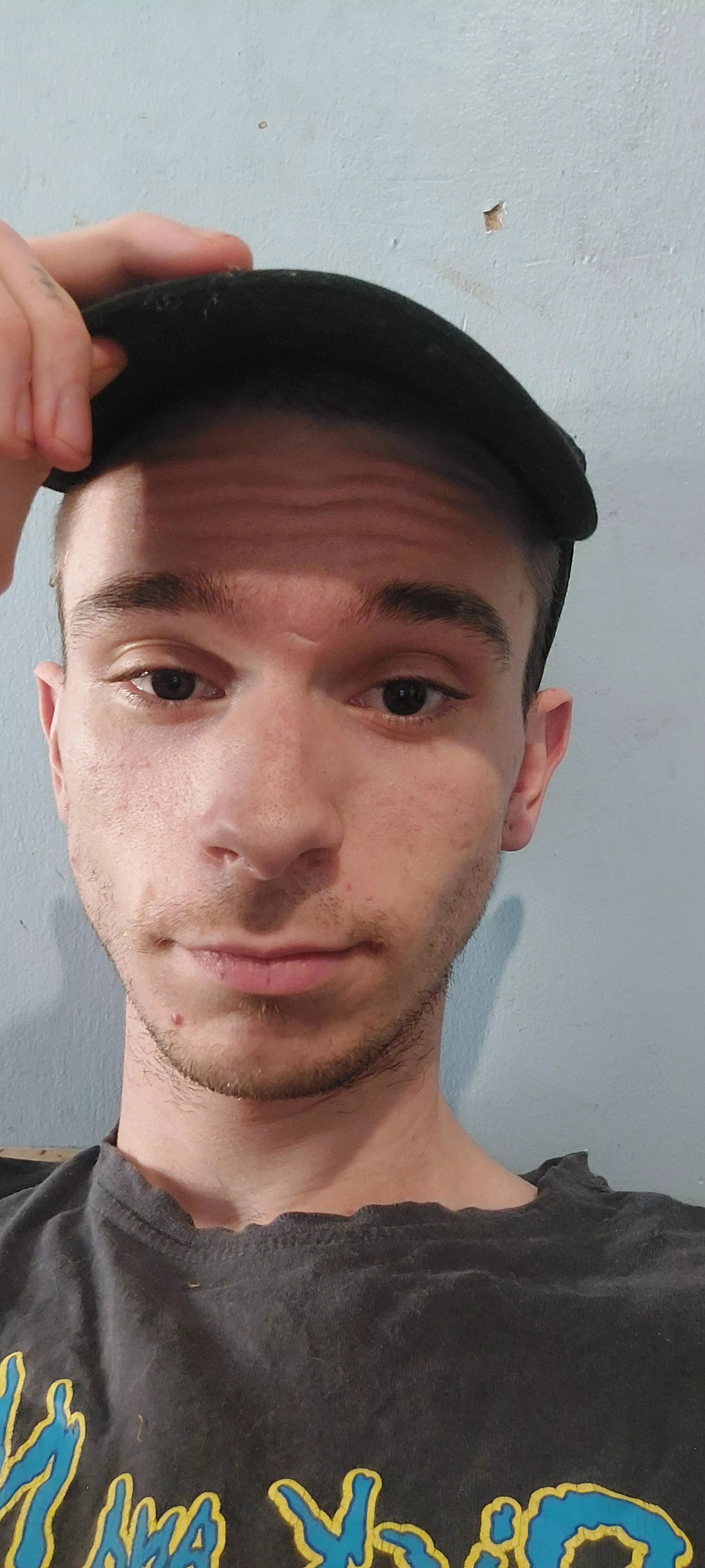 Having to wear a hat cause the buzz cut just ain't it Having to wear a hat cause the buzz cut just ain't it