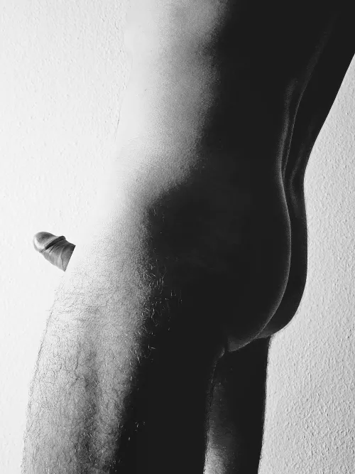 Sculpted in shadows, a quiet strength emerges.