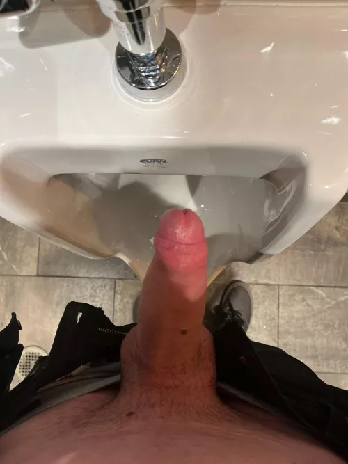 At the urinal