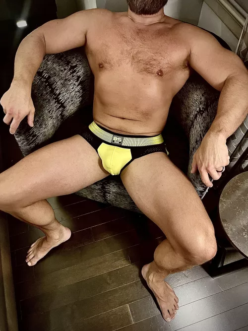 Just a dad [47] lounging in his jock strap. Who wants to come and serve me?