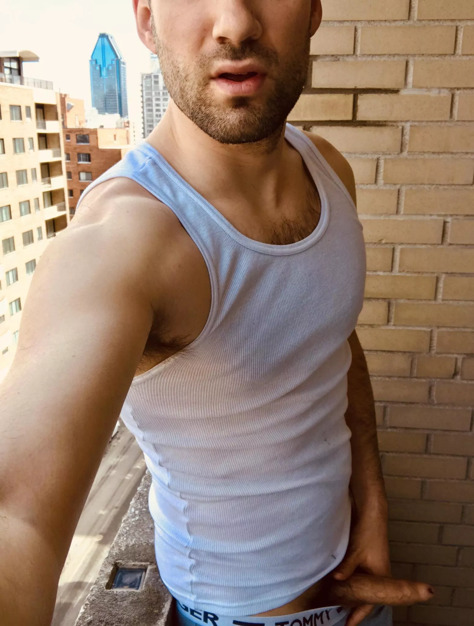 Pants down on the balcony!