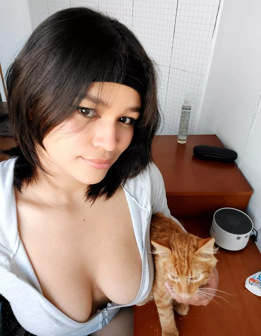 petting my spoiled cat  