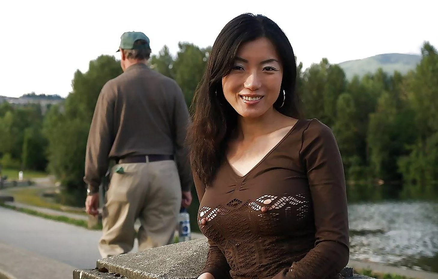 The holes in her top give new meaning to 