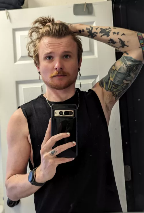 Growing my hair out, it's in that awkward phase - so fighting the urge to buzz it.