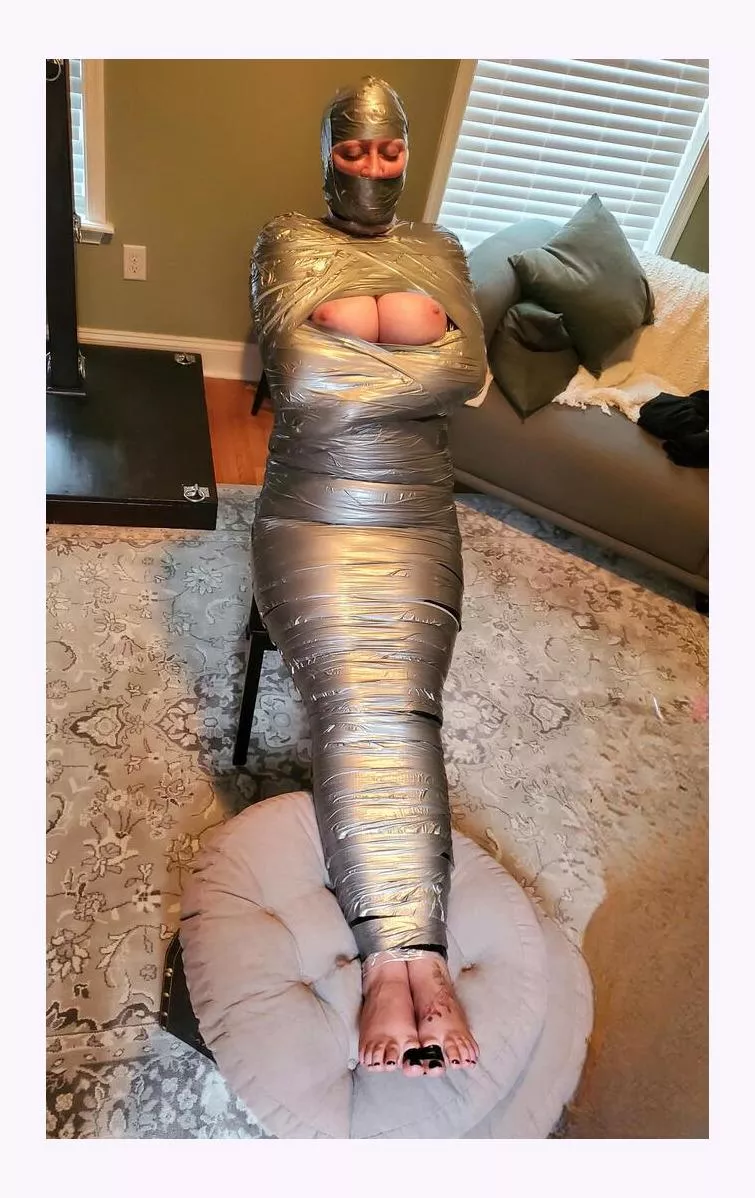 What do you do when her flight is delayed because of snow...how about a nice tight mummification?