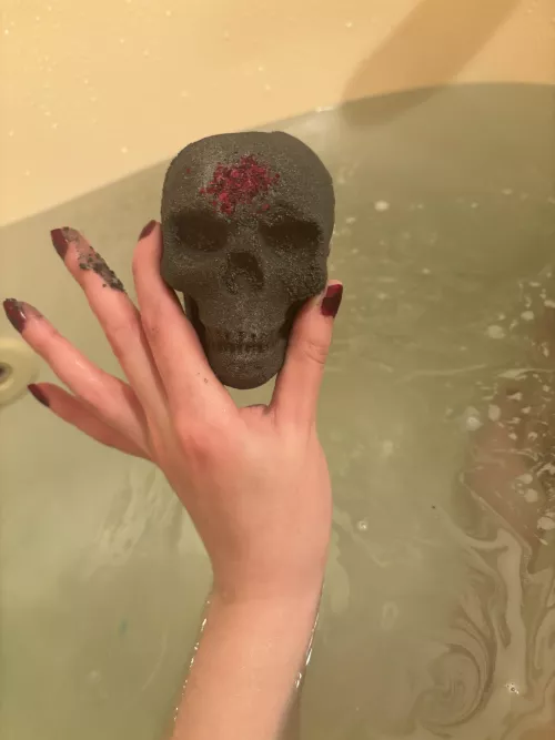 Hands on a bath bomb