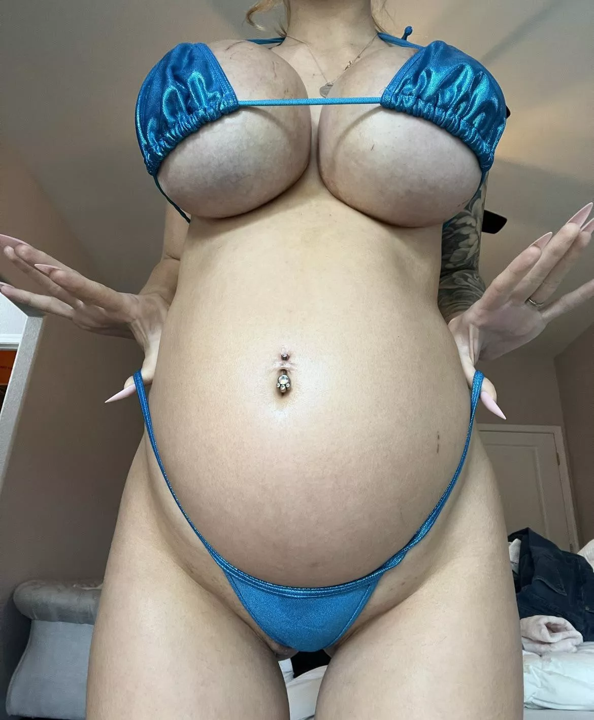 How would you describe my pregnant growing body?