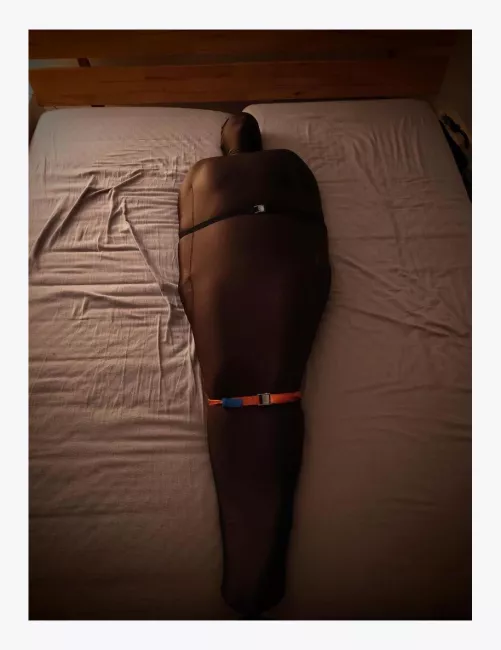 I put my wife with a diaper and Zentai suit in a body bag and tied her to the bed frame with straps. I hope she enjoyed it!