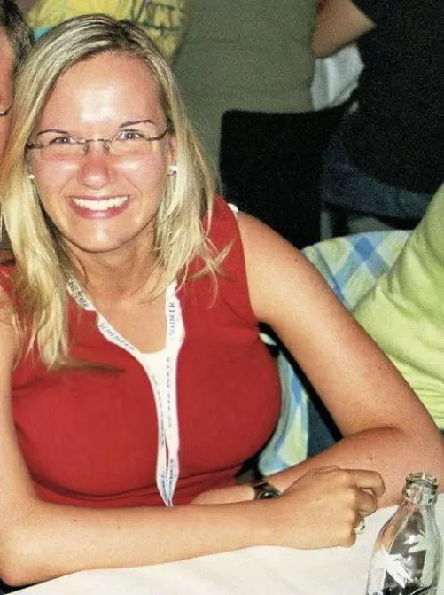 Busty blonde in tight red top