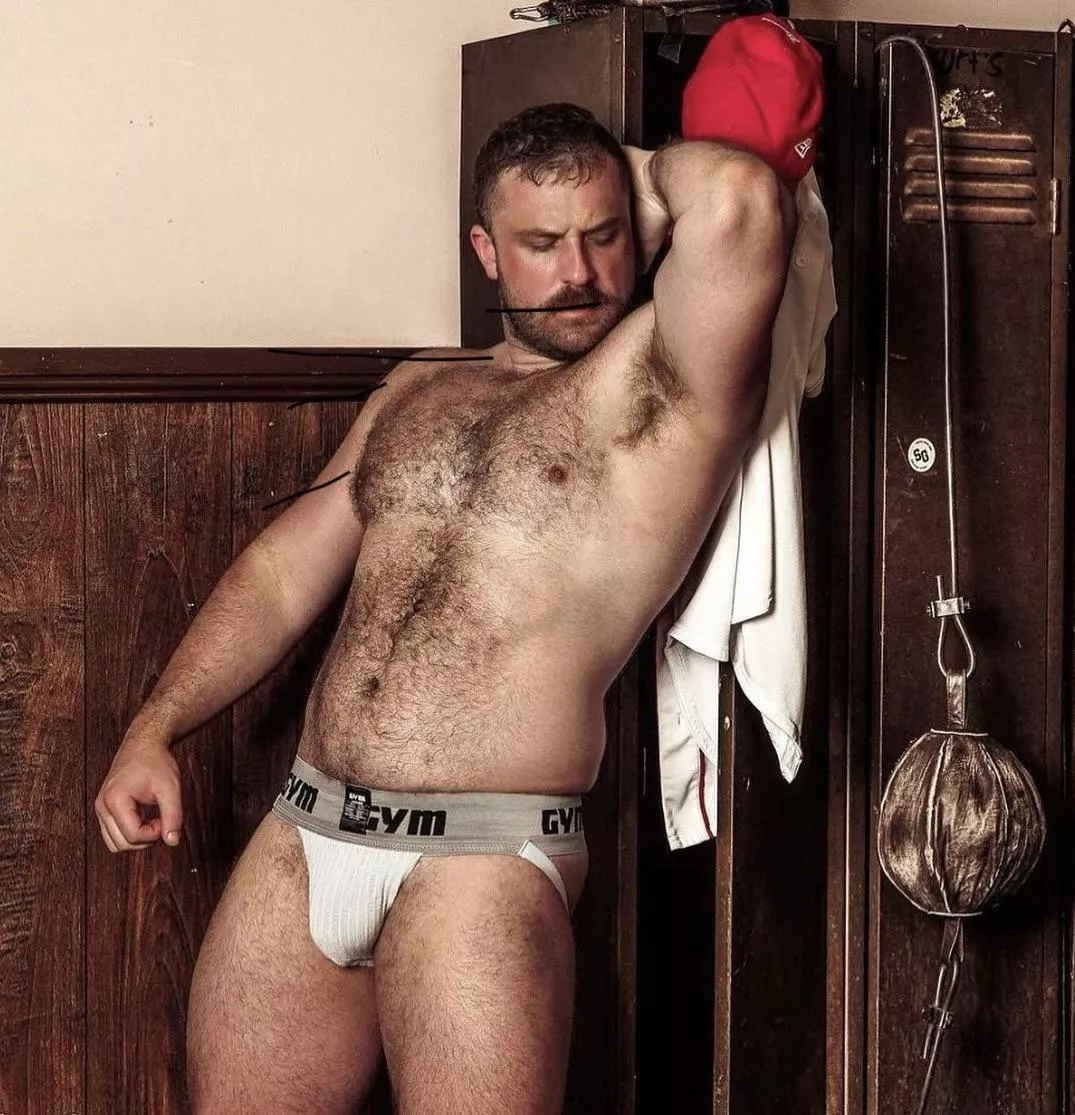 Showing his armpit at the lockers 