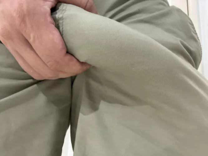 Struggling to hide my hard cock