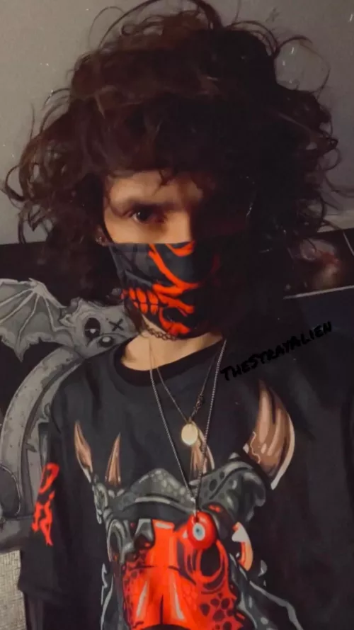 A teddy bear in a dinosaur costume 🧸🦖