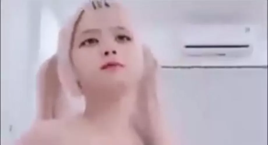 Anyone knows who she is?