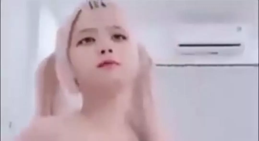 Anyone knows who she is?