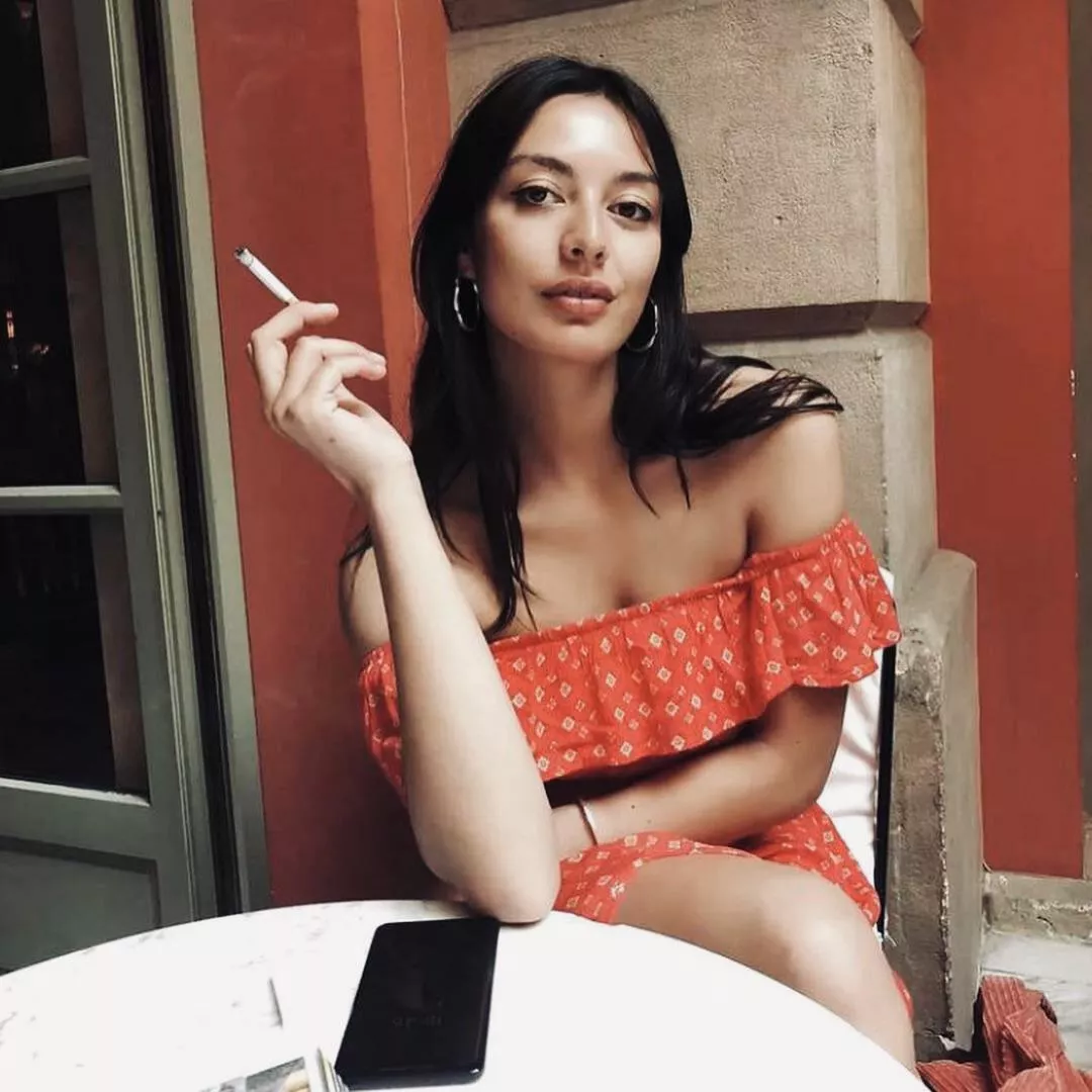 At the cafe, your date asks for a table outside so she can smoke