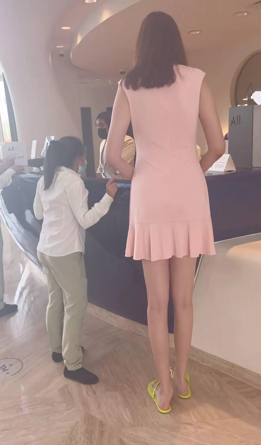 Hotel employee with guest