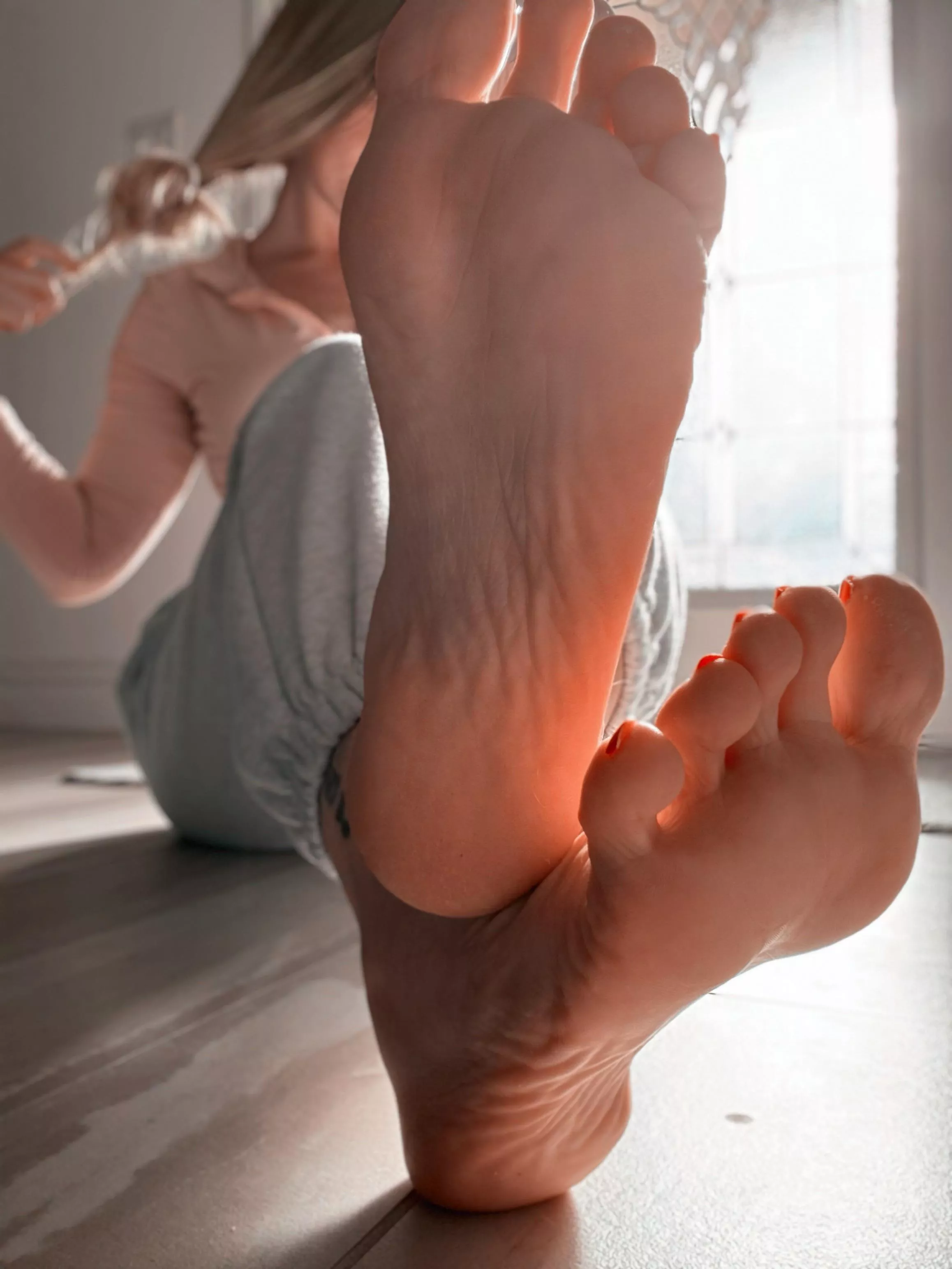 Setting my hair free, getting cozy for you to worship at my feet.