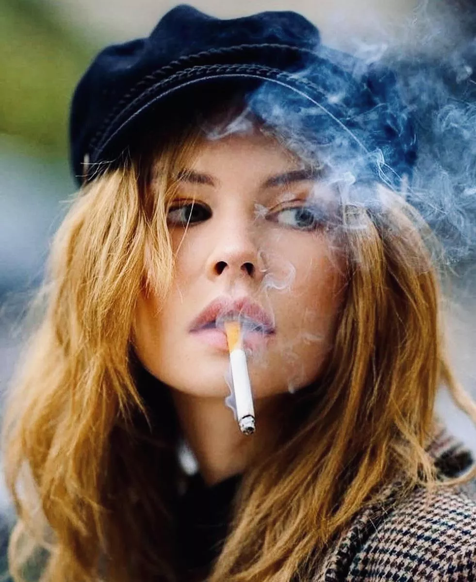 She plays to the crowd of men who are watching