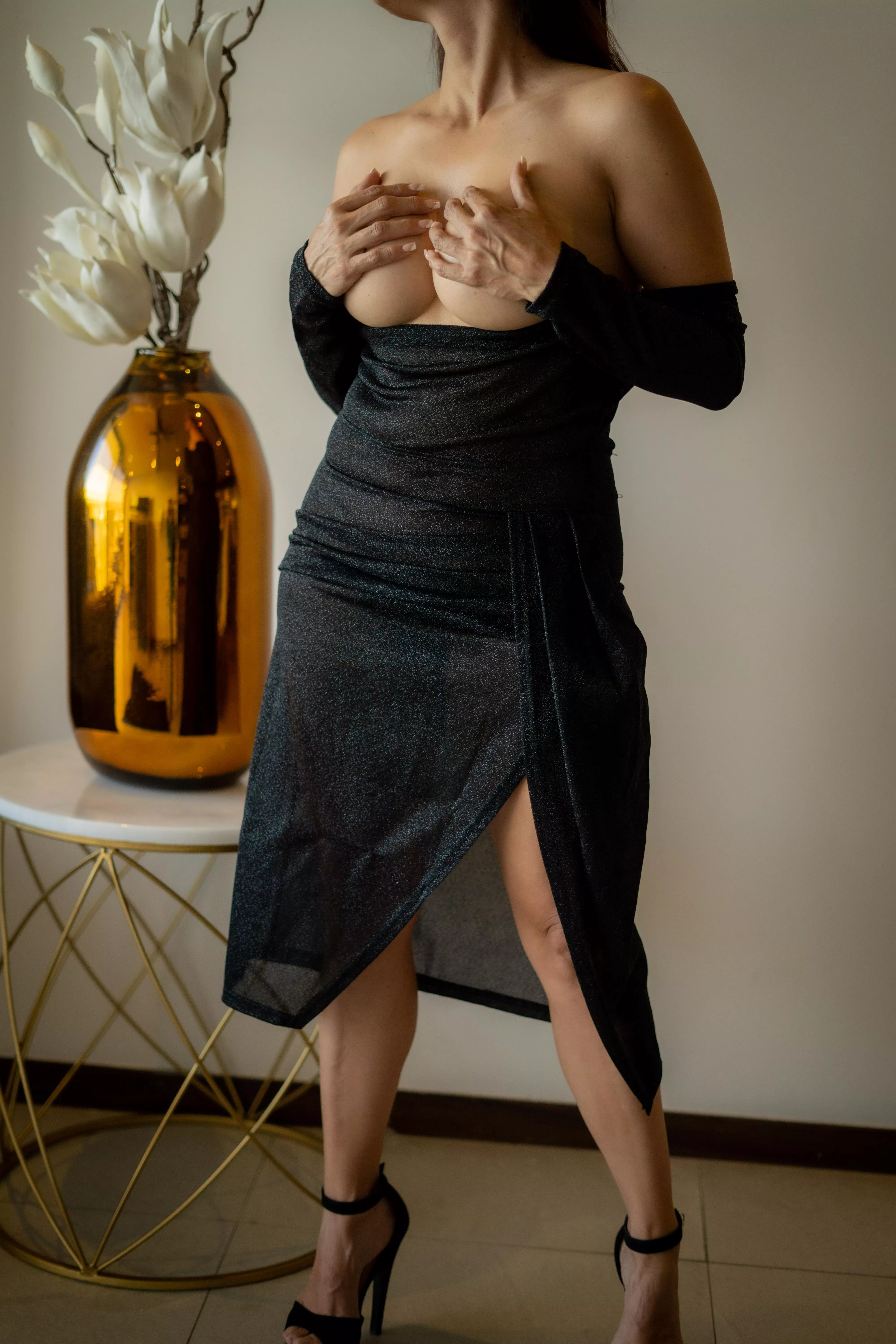 You'd love this dress, is kind of see through, big cleavage both at chest and leg area.