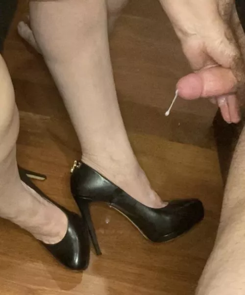 I love the feel of a cock shooting a load on my shoes .