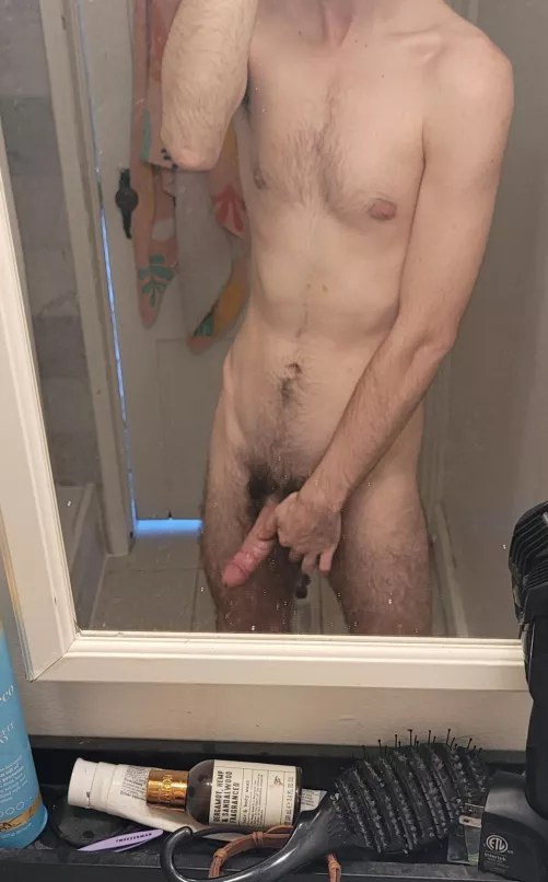 in the mirror admiring my body hair