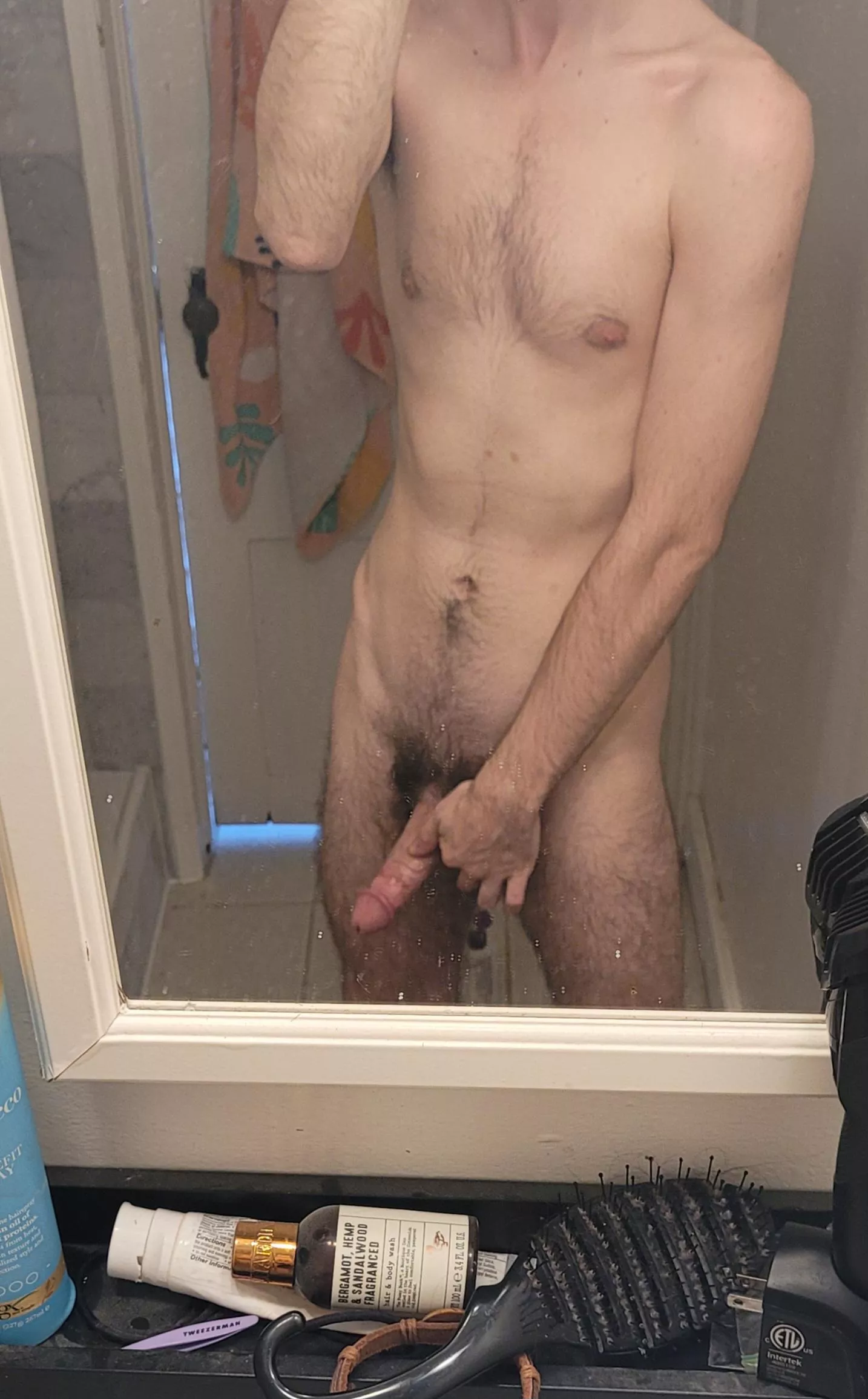 in the mirror admiring my body hair