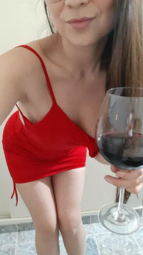 Is a good glass of wine and a red dress a good combination