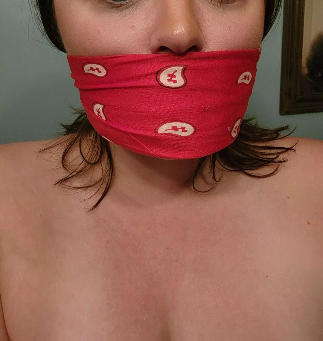 Naked and mouth stuffed, just how he likes it