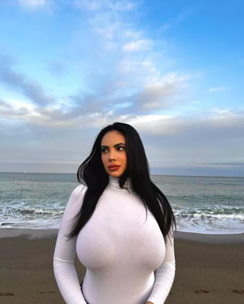 Busty by the seaside