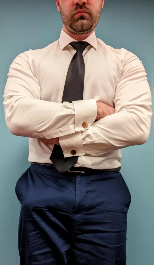 Strong forearms stretching my shirt and my powerful cock stretching my suit pants.