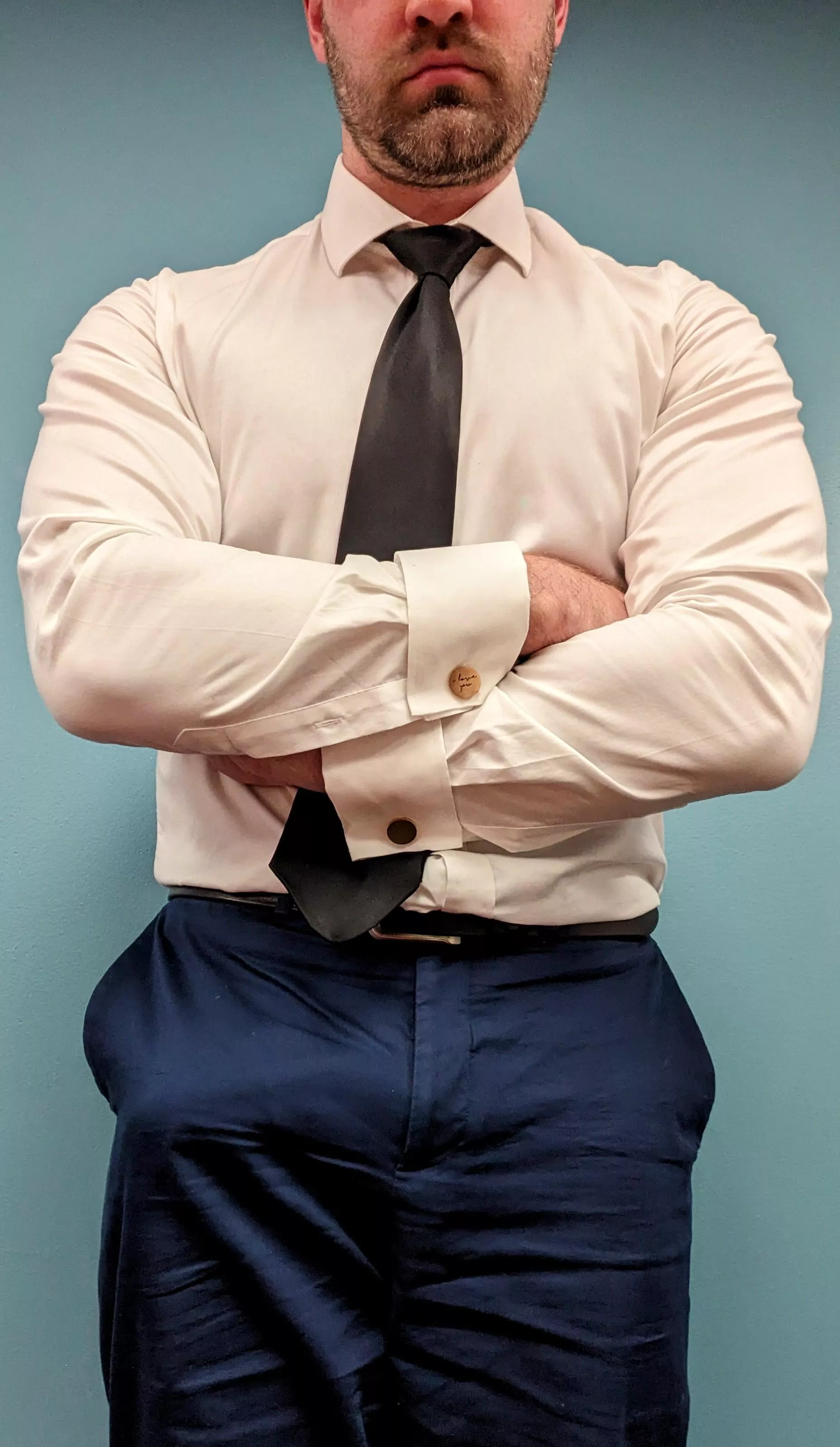 Strong forearms stretching my shirt and my powerful cock stretching my suit pants.