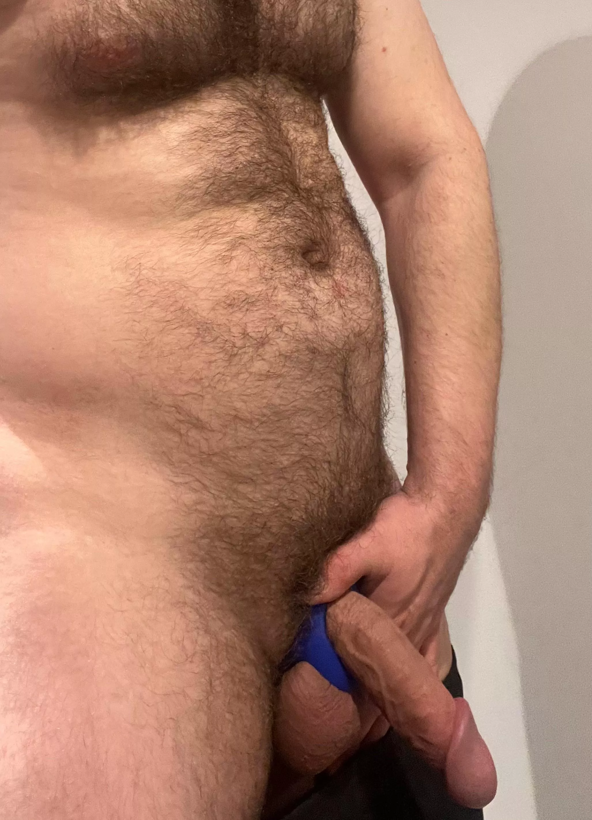 A hairy body and a veiny cock.
