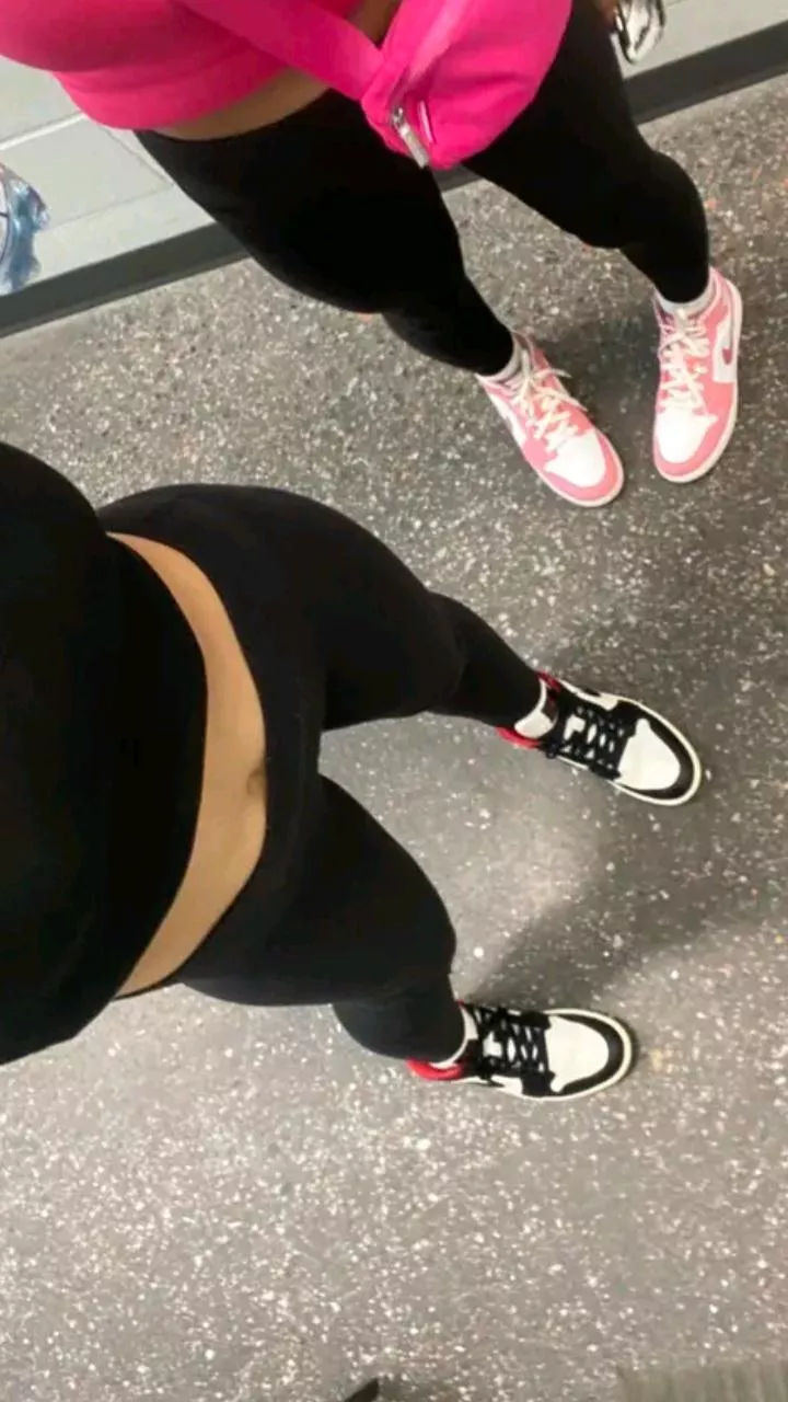 Black leggings and a little bit of belly showing