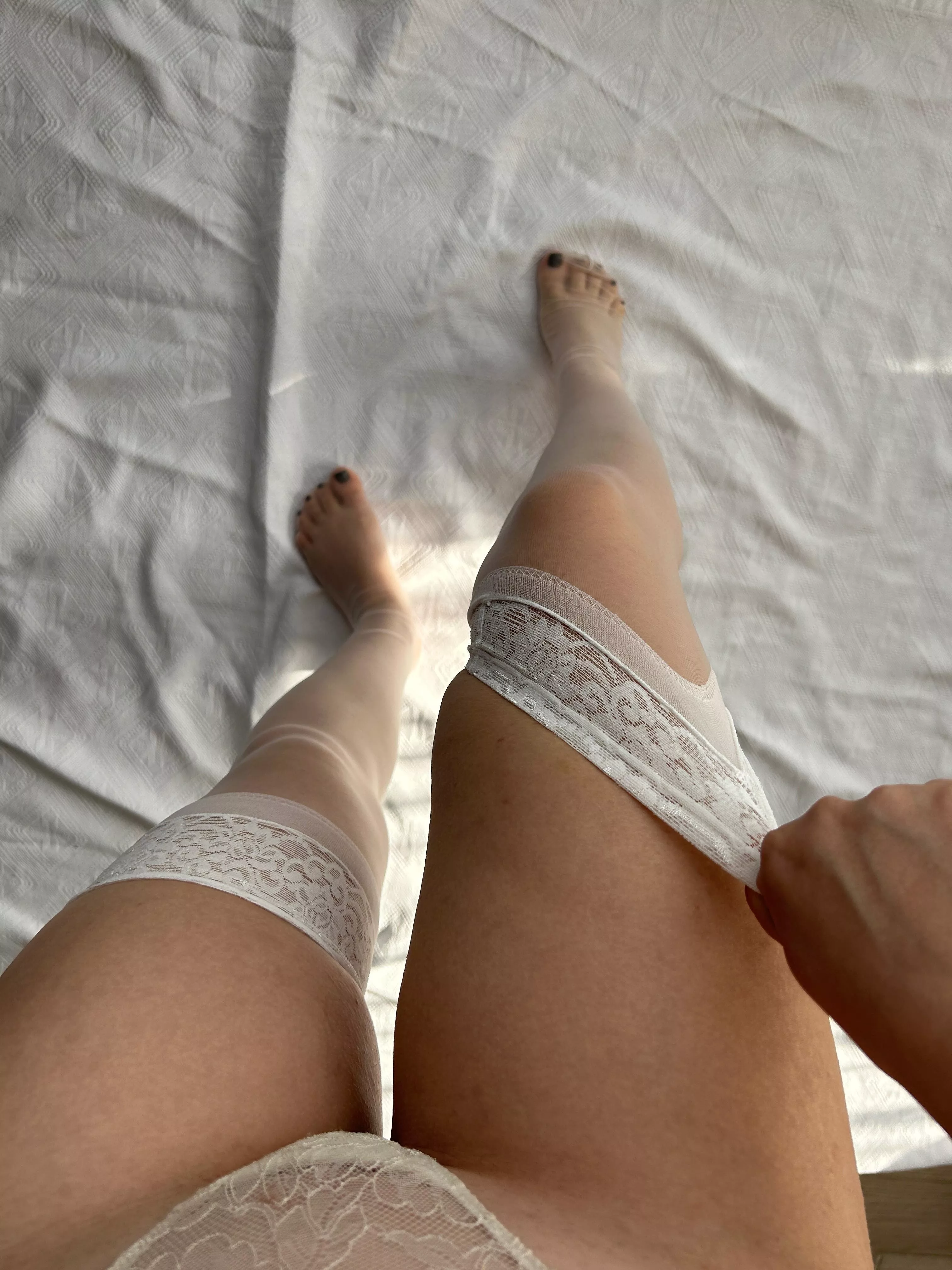 Do you like my slender legs in stockings